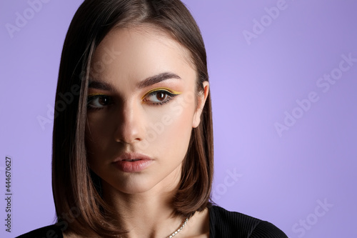 Beautiful young woman on co...