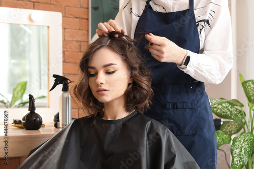 Female hairdresser working ...