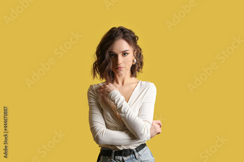 Beautiful young woman on co...