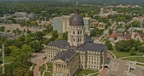 Topeka Kansas panning aerial around the Capitol Statehouse with tilt up reveal to the horizon - 6k professional smooth footage - August 2020 photo