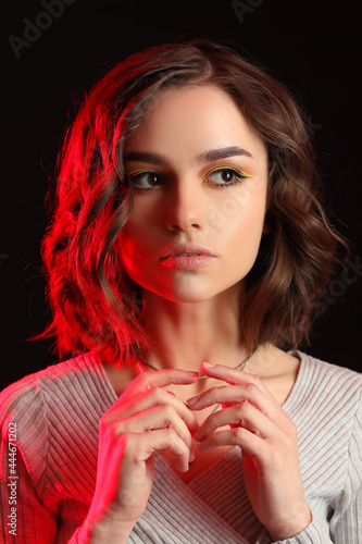 Beautiful young woman on da...
