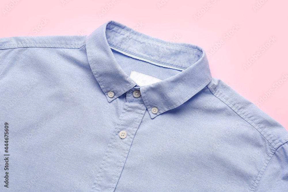 Stylish male shirt on color background Stylish male shirt on color background