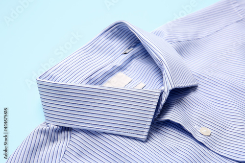 Stylish male shirt on color background, closeup