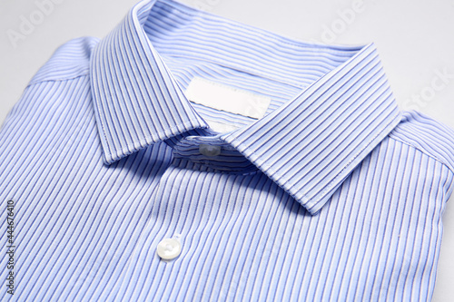 Stylish male shirt on light background, closeup