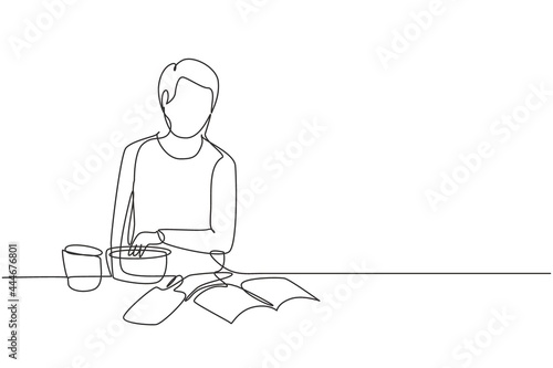 Single continuous line drawing handsome male cooking meal while reading tutorial book on cozy kitchen table at home. Healthy food lifestyle. Dynamic one line draw graphic design vector illustration