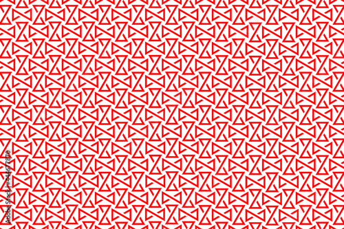 Background pattern from red hourglass triangle symbols. The pattern is evenly filled. Vector illustration on white background.