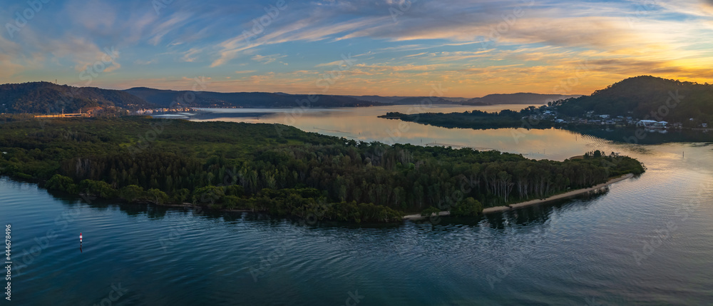 Fototapeta premium High cloud sunrise winter waterscape panorama