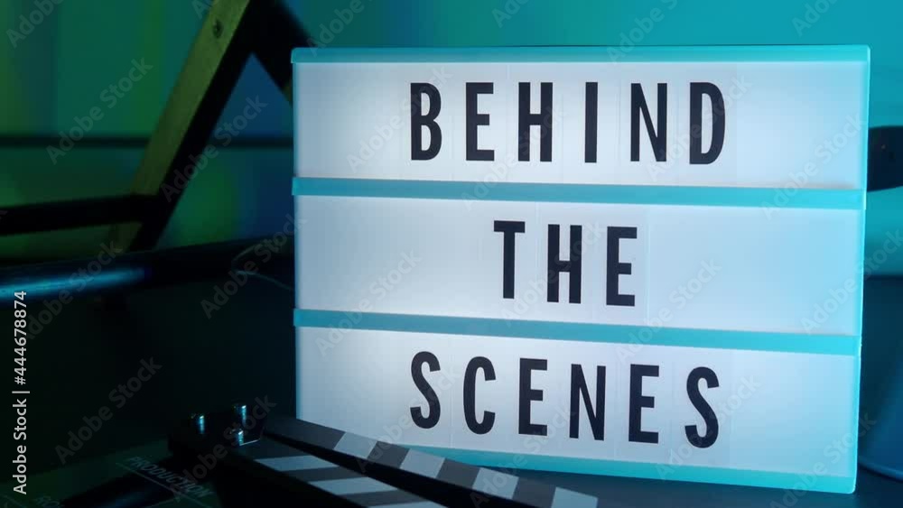 Behind the scenes lightbox in studio. letterboard text lightbox. Color light changing. Cinema Light box beside movie slate clapperboard megaphone and director chair. video production Behind the scenes Behind the scenes lightbox in studio. letterboard text lightbox. Color light changing. Cinema Light box beside movie slate clapperboard megaphone and director chair. video production Behind the scenes