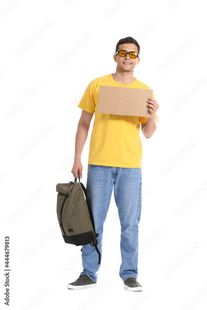 Young man with cardboard and backpack on white background Young man with cardboard and backpack on white background