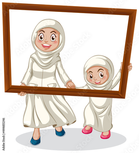 Happy mother and daughter holding photo frame