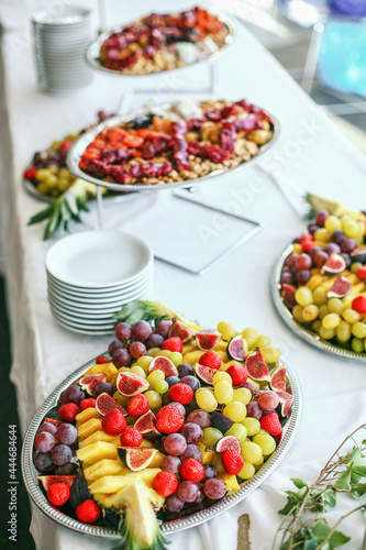 Different fruits and light appetizers provided during catered events. Close-up.