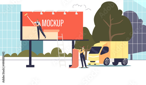 Workers installing new advertising poster mockup for advertisement outdoors on billboard