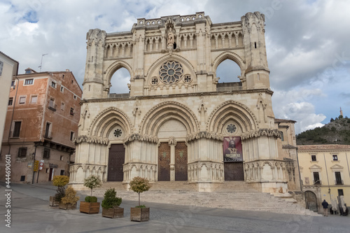 Majestic detailed view at the gothic front facade building at the Cuenca cathedral