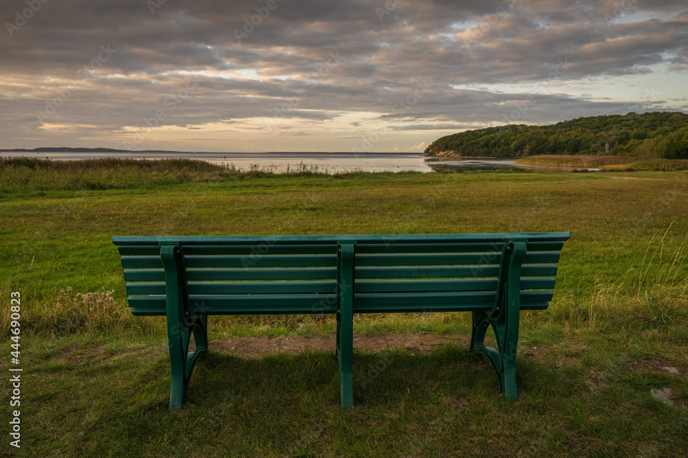 A bench with views over the coast at the Jasmunder Bodden in Lietzow, Mecklenburg-Western Pomerania, Germany