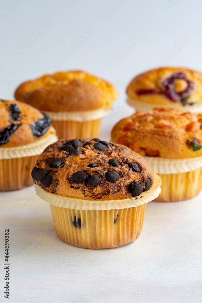 Muffins. Assortment of muffins on a white background. Muffins. Assortment of muffins on a white background.
