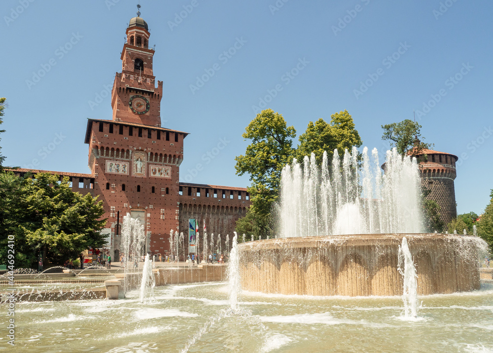 Filarete tower,main entrance of the Castello Sforzesco or Sforza Castle in Milan and the fountain.Lombardy, Italy.