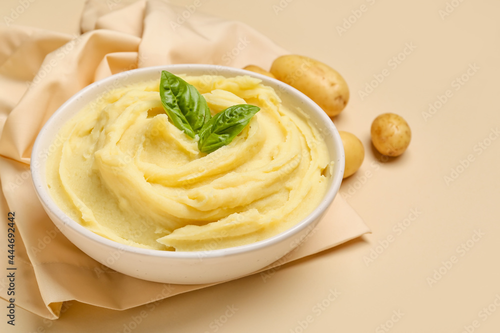 Bowl with tasty mashed potatoes on color background, closeup Bowl with tasty mashed potatoes on color background, closeup