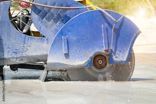 Machinery cutting concrete hi power at construction