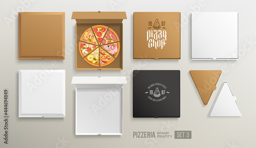 White and black pizza cardboard box with logo set blank Mockup isolated on grey. Empty pizza slice box top view mockup template for logo design. Realistic pizza in open paper cardboard box  photo