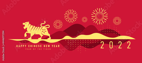 chinese new year 2022, year of the tiger banner with gold tiger zodia are roaring stand on abstract modren curve mountain and firework vector design