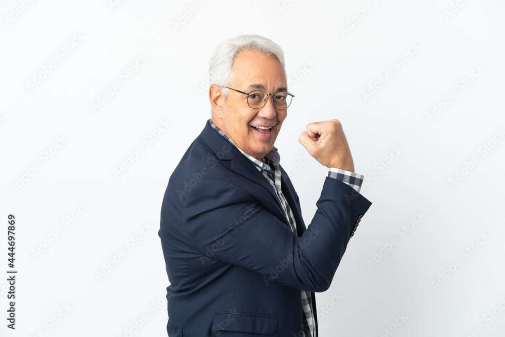 Middle age Brazilian man isolated on white background doing strong gesture Middle age Brazilian man isolated on white background doing strong gesture