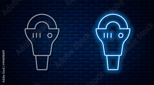 Glowing neon line Angle grinder icon isolated on brick wall background. Vector
