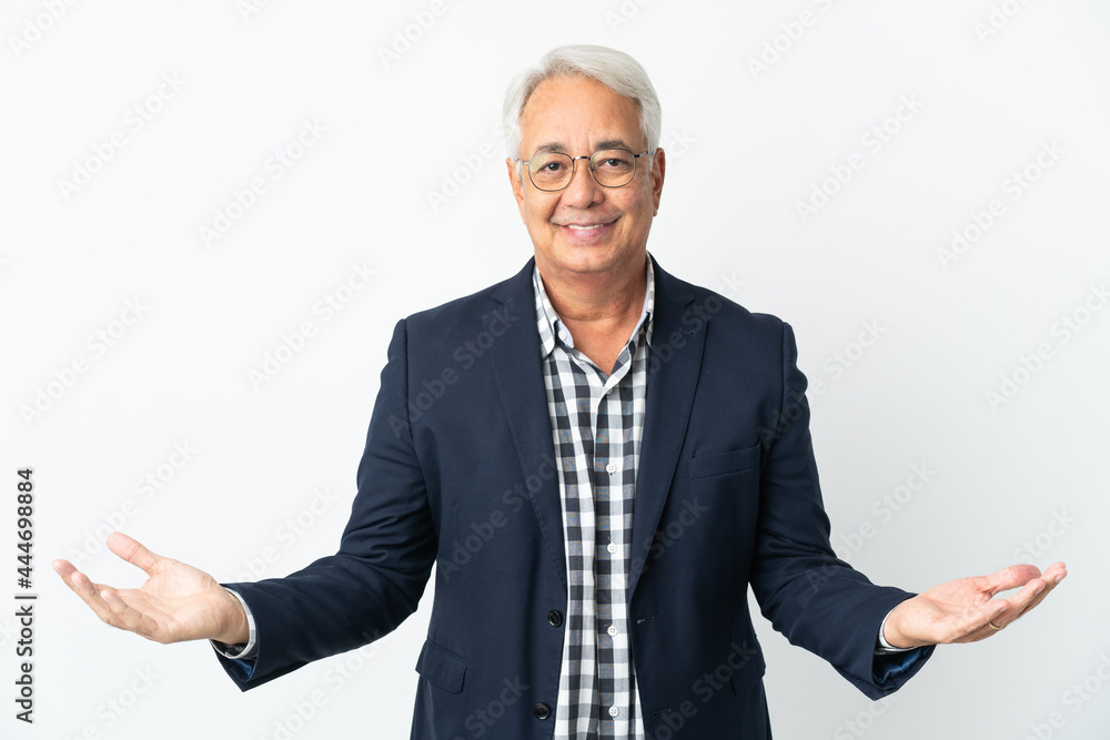 Middle age Brazilian man isolated on white background having doubts Middle age Brazilian man isolated on white background having doubts