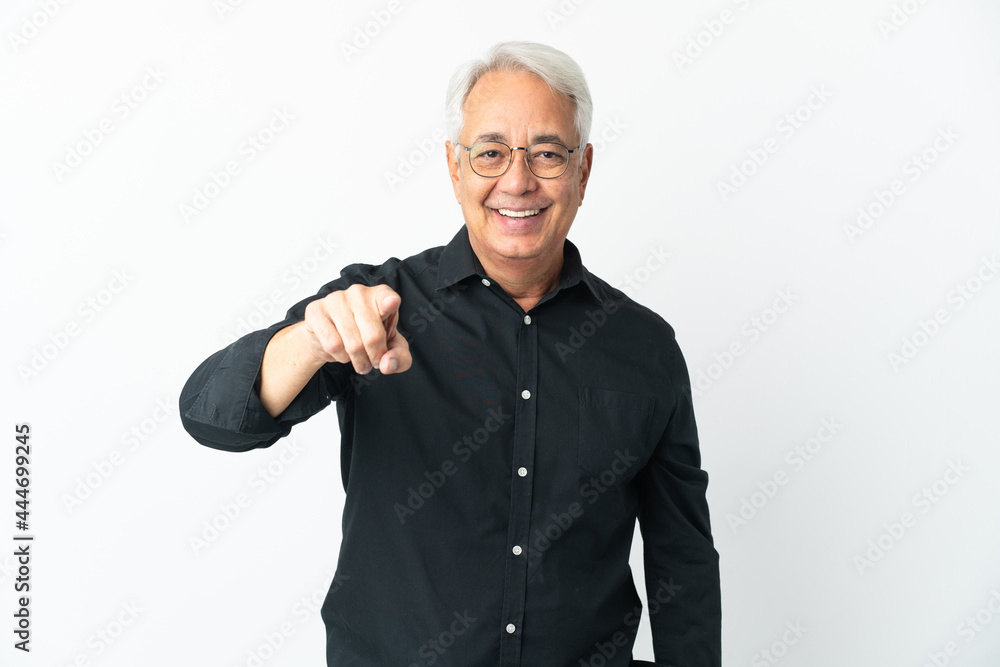 Middle age Brazilian man isolated on white background surprised and pointing front Middle age Brazilian man isolated on white background surprised and pointing front