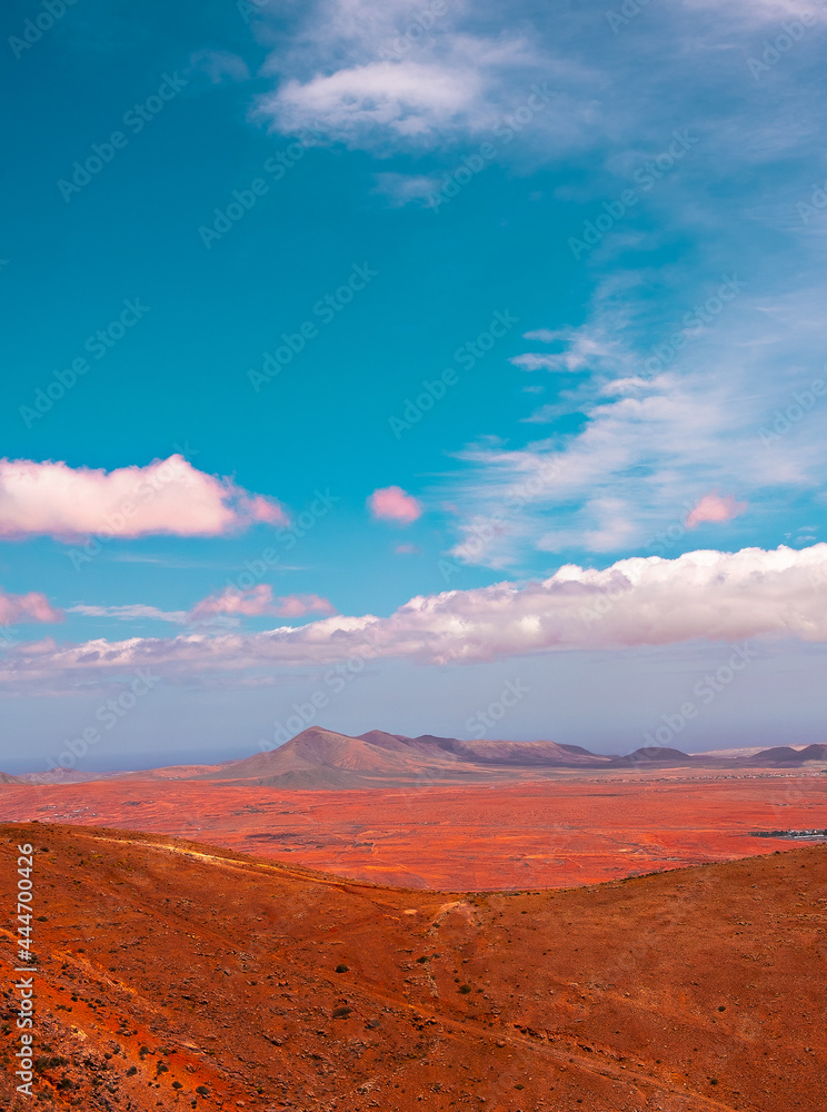 Volcanic desert and sky view. Canary islands. Fuerteventura. Stylish nature visual spirits wallpaper. Travel concept