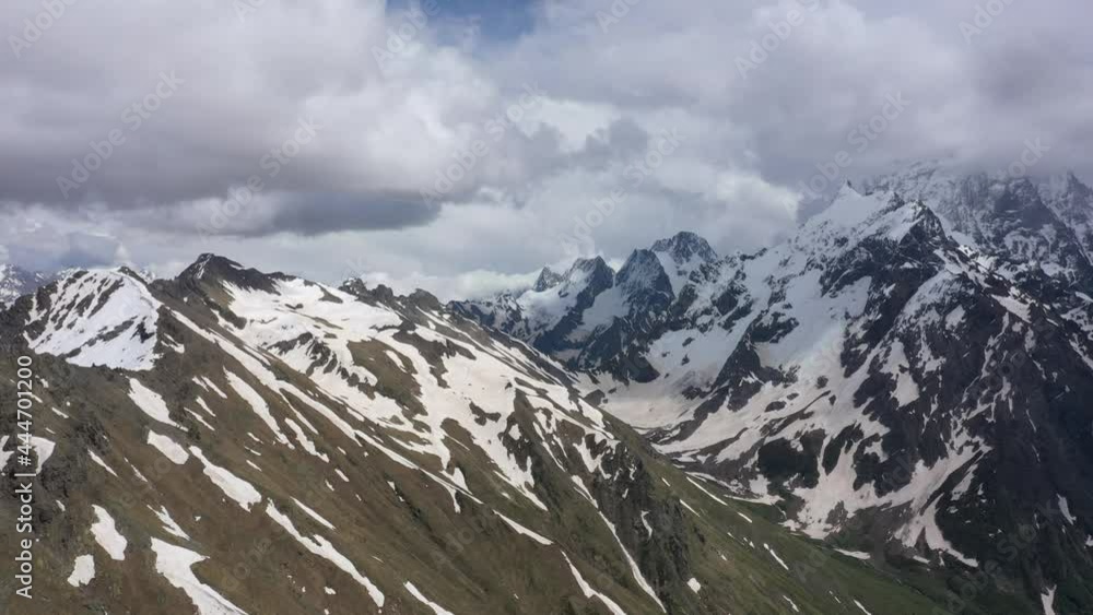 Flight above snowcapped mountains near Elbrus Flight above snowcapped mountains near Elbrus