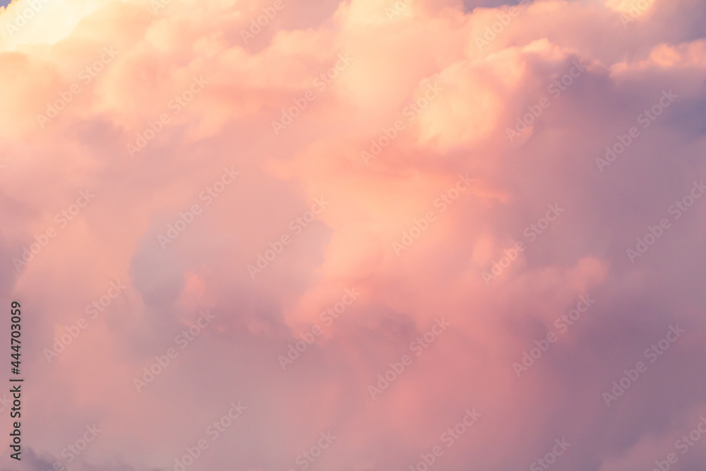 Sunset sky background with pink, purple and blue dramatic colorful clouds, vast sunset sky landscape