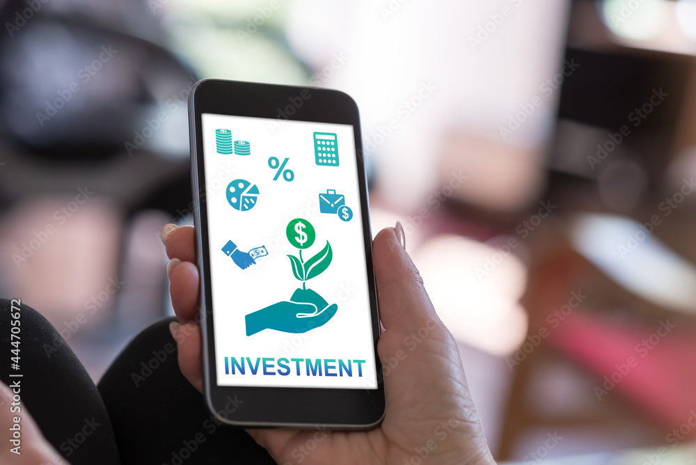 Fototapeta premium Investment concept on a smartphone