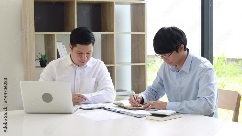 Business meeting, Brainstorm team, Analyzing charts to plan strategies. Business meeting, Brainstorm team, Analyzing charts to plan strategies.