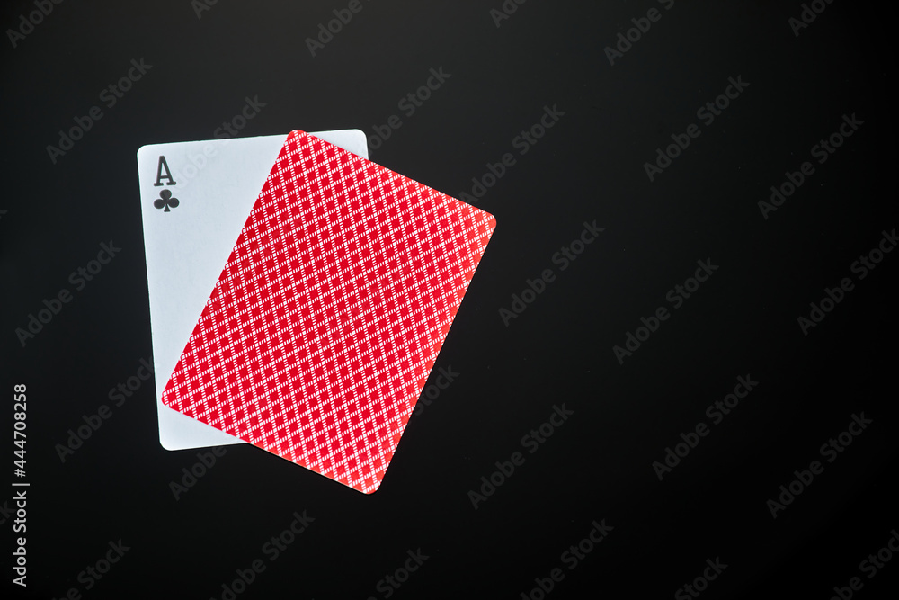 playing cards with ace on dark reflective background playing cards with ace on dark reflective background