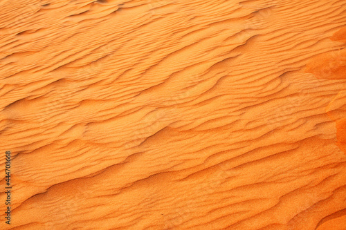 Sand of orange color in desert, UAE