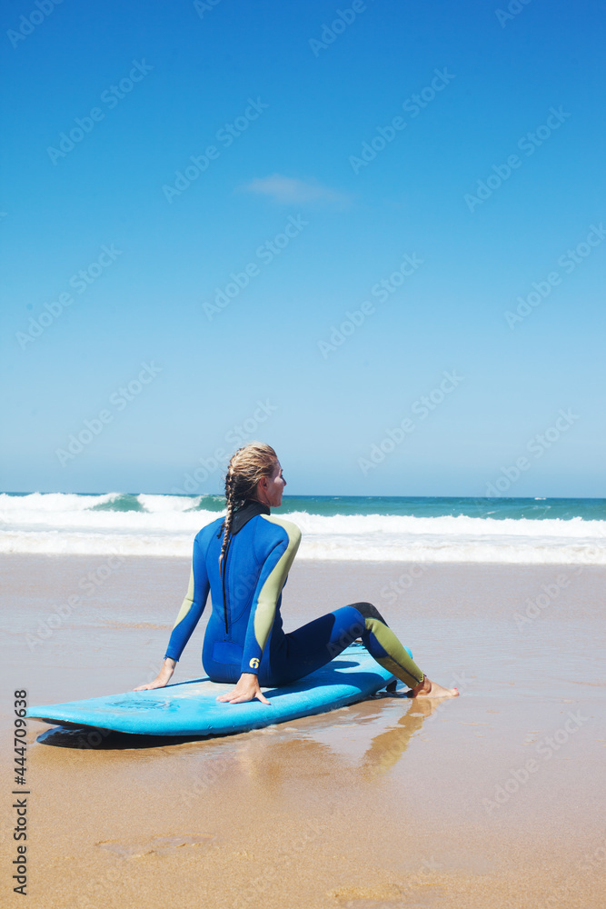 Surf girl relax at beach, portugal summer vacations, sport time Surf girl relax at beach, portugal summer vacations, sport time