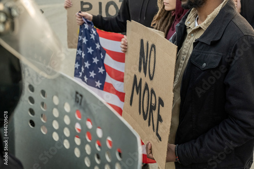 People with Signs Urging Government