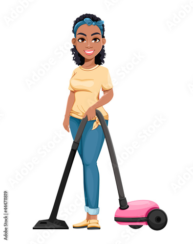 Pretty African American housewife vacuuming