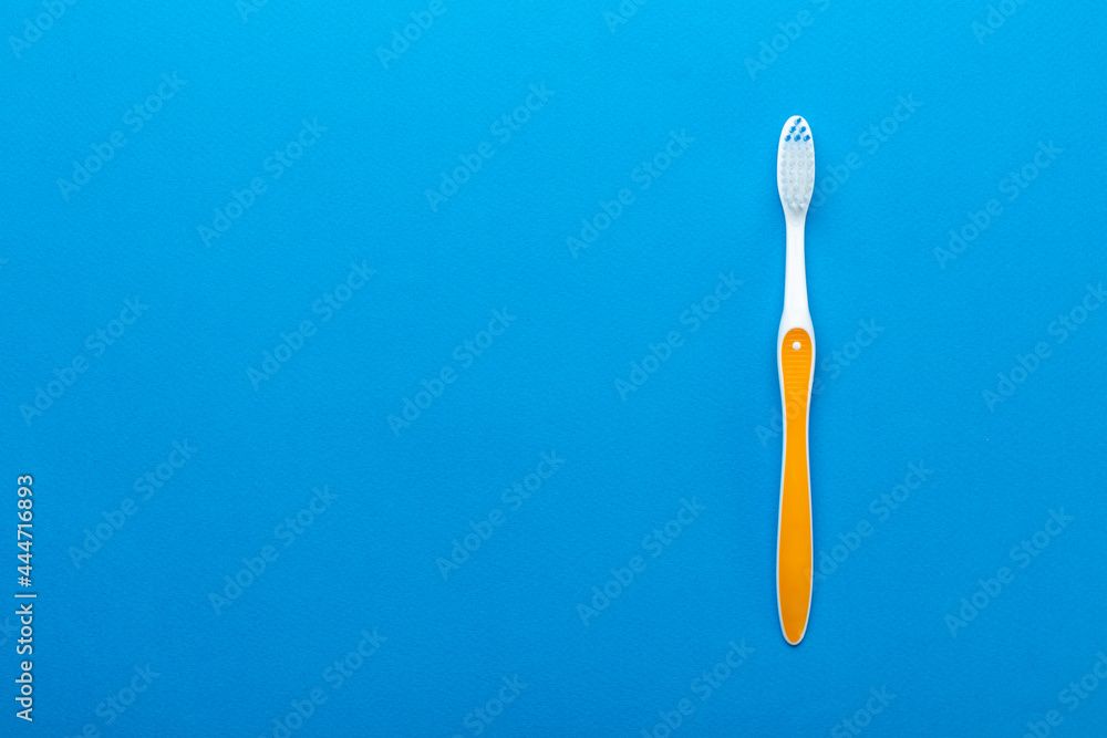 Toothbrushes on a blue background. Concept toothbrush selection. Oral cavity care. Dental hygiene. Toothbrushes on a blue background. Concept toothbrush selection. Oral cavity care. Dental hygiene.