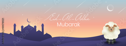 Islamic festival of sacrifice, Eid-Ul-Adha Mubarak banner with mosque silhouette, and sheep in evening background.