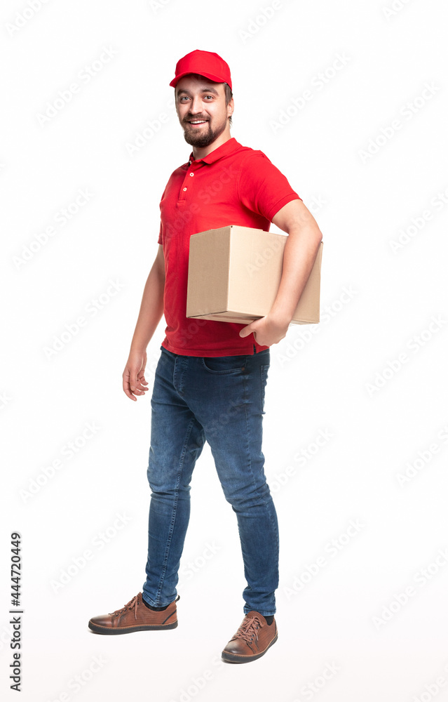 Cheerful delivery man with carton box Cheerful delivery man with carton box