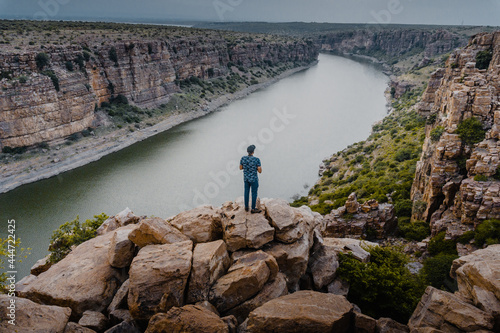 person walking on the river