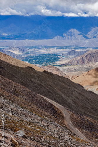 Road in Himalayas near Kardung La pass. Ladakh, India photo