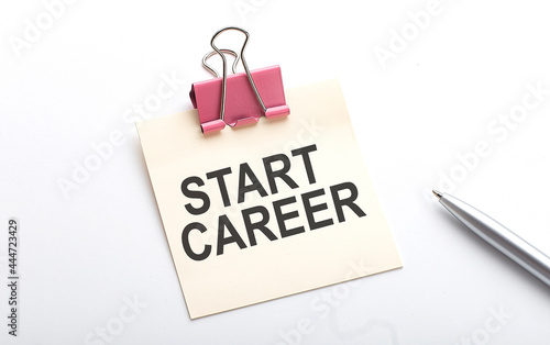 START CAREER text on sticker with pen on the white background