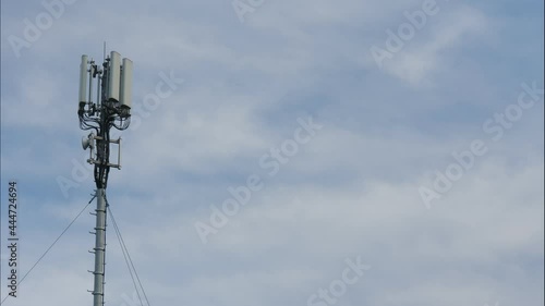 Mobile telephone radio network antenna 4G or 5G on telecommunication mast against sky. New technology generation. Radiation, human health issues.