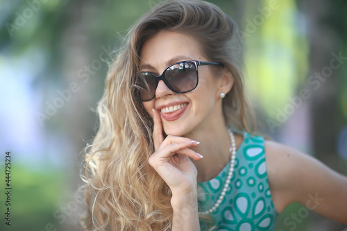 portrait temptation girl finger mouth lips / young adult sexy girl, concept female beauty, smilling