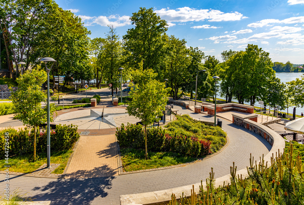 Sundial Park at Wojska Polskiego street over Jezioro Elckie lake in Elk town in Masuria region in Poland Sundial Park at Wojska Polskiego street over Jezioro Elckie lake in Elk town in Masuria region in Poland