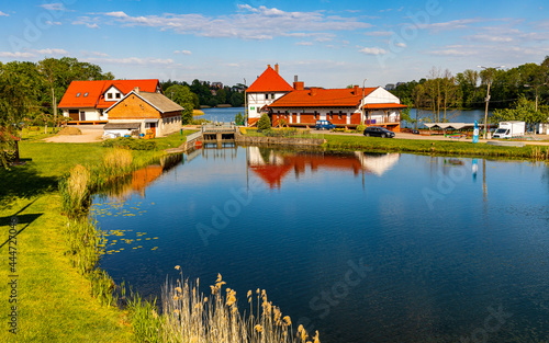 Fototapeta Naklejka Na Ścianę i Meble -  Ponds and reservoir facilities of traditional masurian fishing farm in Elk town of Masuria region in Poland
