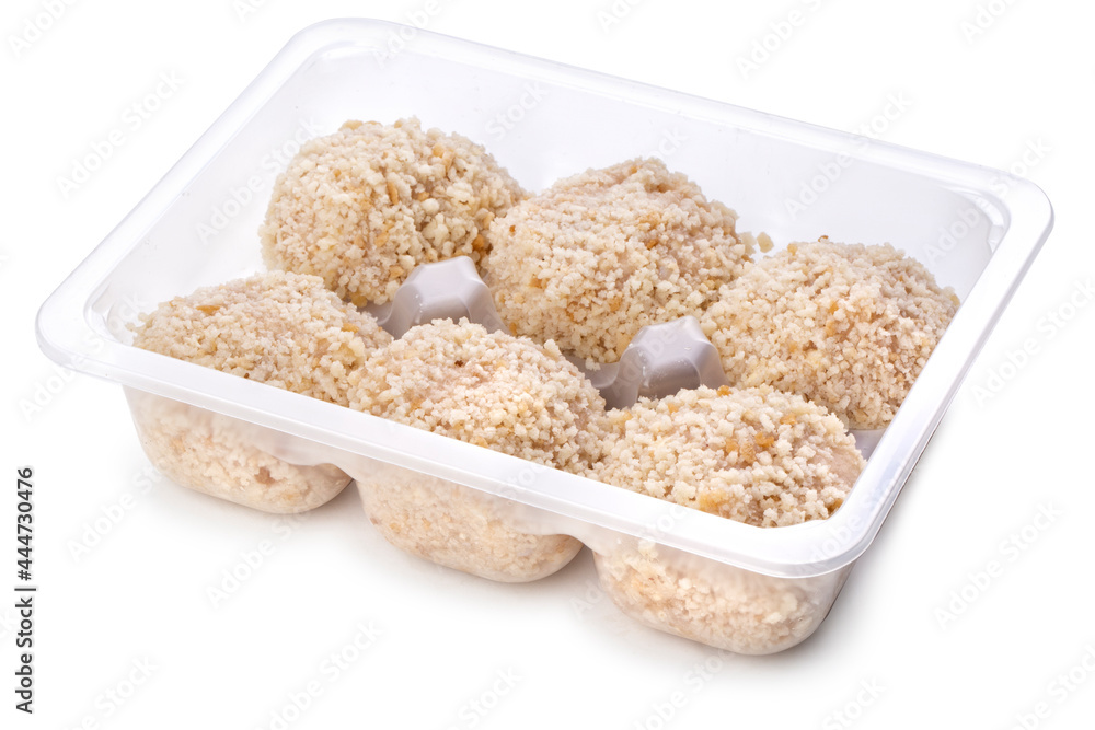 Raw fresh chicken cutlets in plastic transparent container Raw fresh chicken cutlets in plastic transparent container