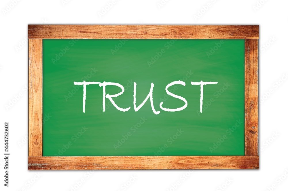 TRUST word written on green school chalkboard TRUST word written on green school chalkboard